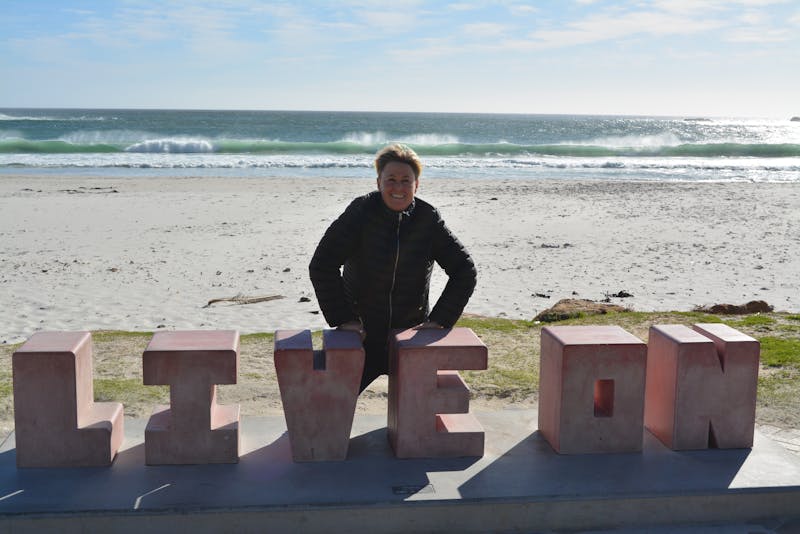 Anita at Live On statue at Camps Bay.