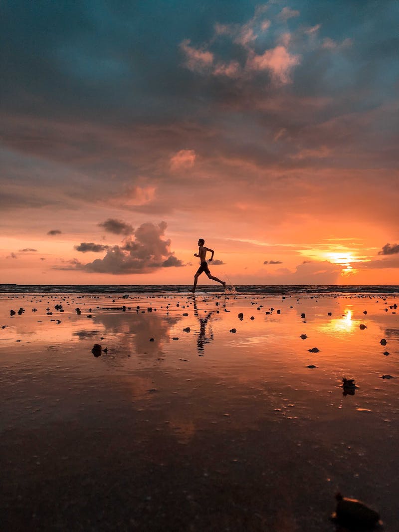 Person jogging through incredible scenery while the sun is setting!