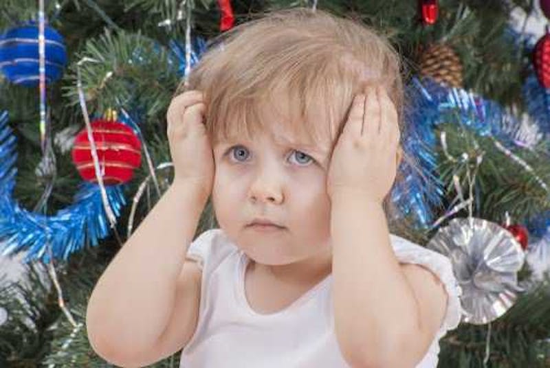 Festive disappointed little girl.