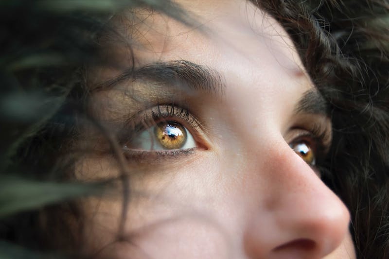 Close up on girl with beautiful brown eyes.