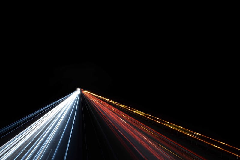 Long exposure highway with car headlights and taillights.