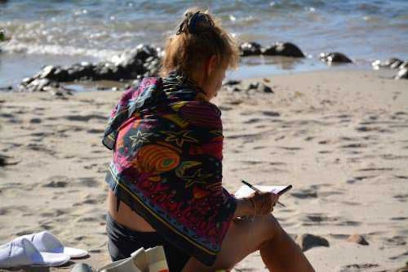 Lady on a beach in Cape Town.