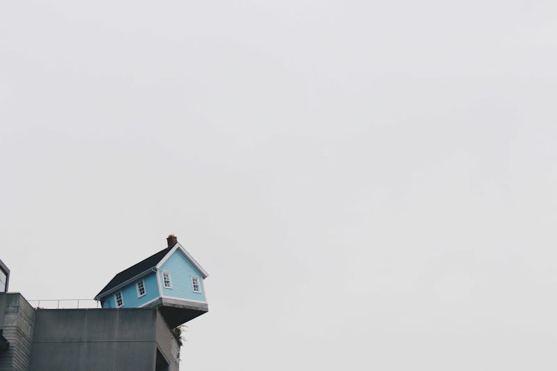 House at the edge of a ridge/cliff.