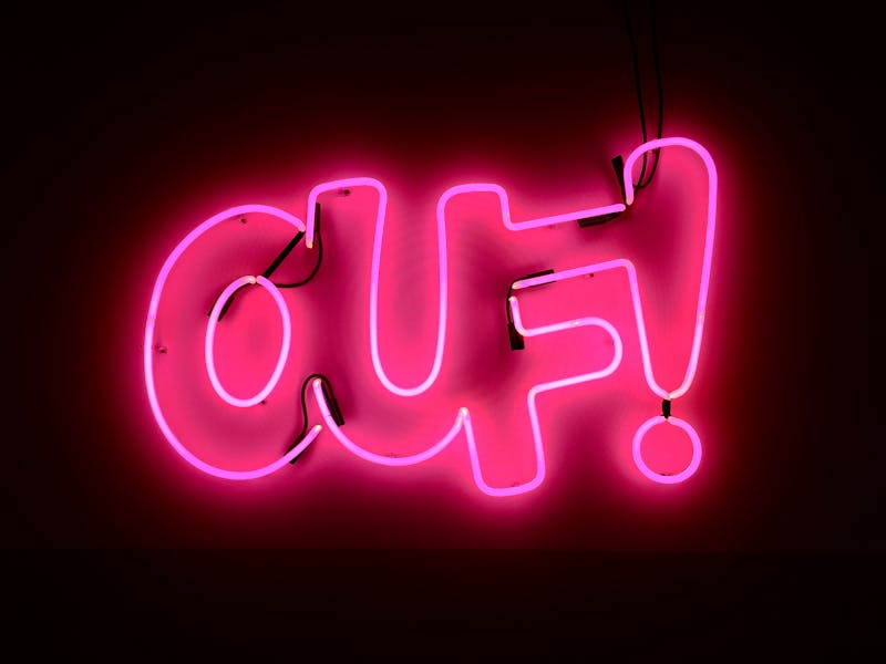 A neon sign that reads "ouf!".