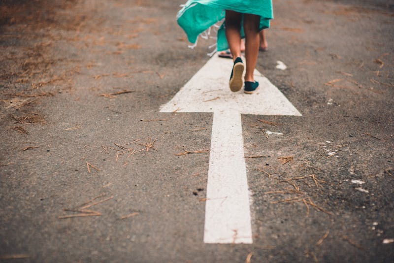 An arrow on a street.