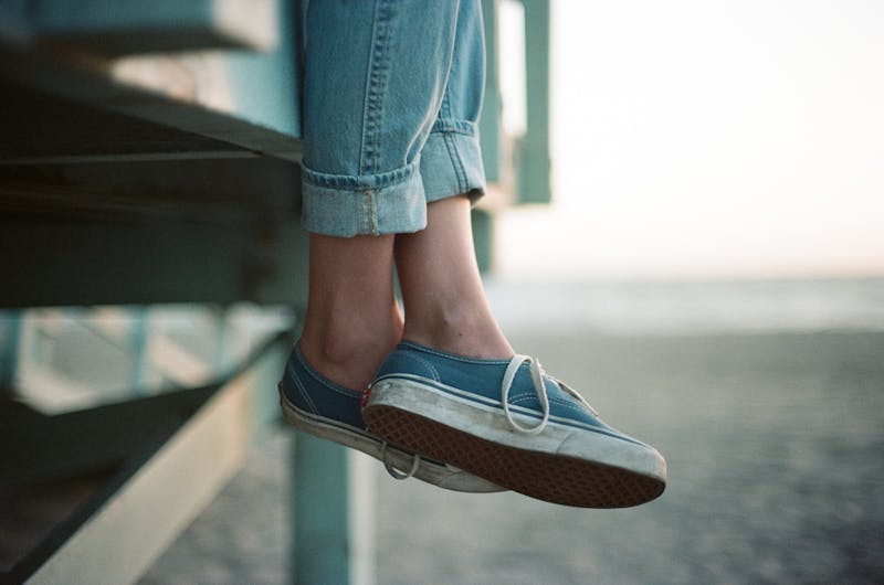 Photo focusing on someone's shoes.